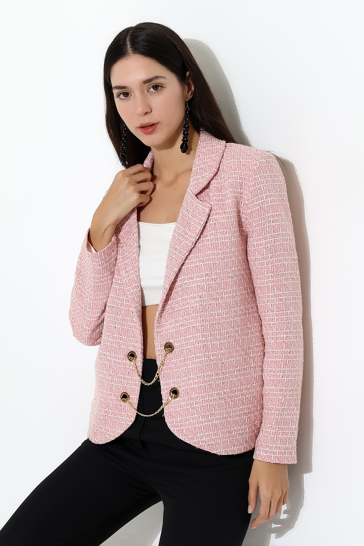 Model showing collar and details of pink jacket 